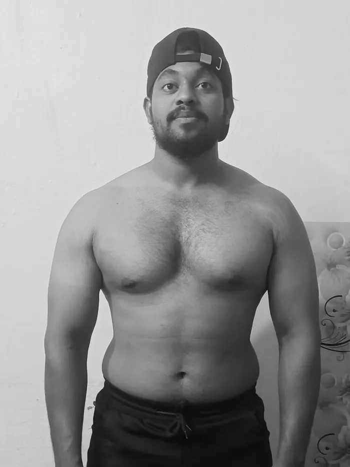 Client three before the program — overweight, standing relaxed